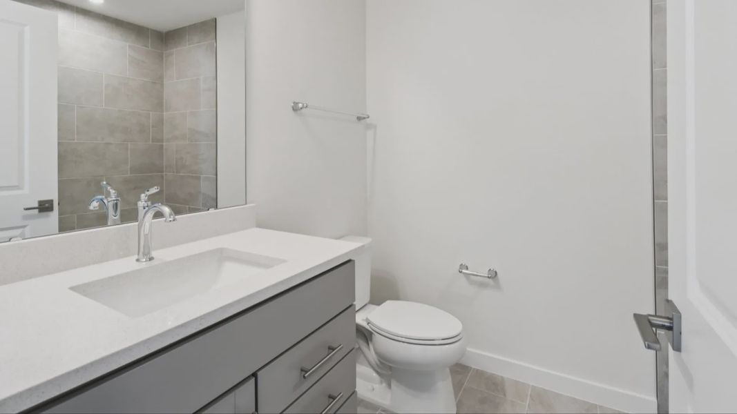 Guest Bath in the Monterey End Townhome by DRB Homes - Cyrene at Harmony in St Cloud FL Guest Bath in the Monterey End Townhome by DRB Homes - Cyrene at Harmony in St Cloud FL