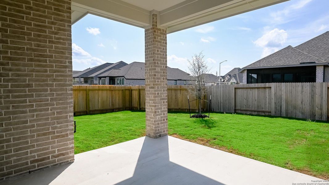 Exterior details and patio area of a home in Meadows Of Mill Creek 50', Seguin (Image 19). Exterior details and patio area of a home in Meadows Of Mill Creek 50', Seguin (Image 19).