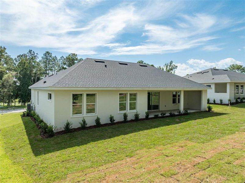 Exterior details and patio area of a home in Southern Hills Plantation, Brooksville (Image 21).