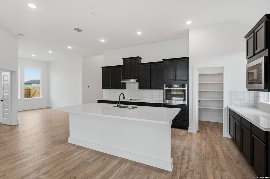 Furnished interior view inside a new home in Alsatian Oaks, Castroville (Image 6).