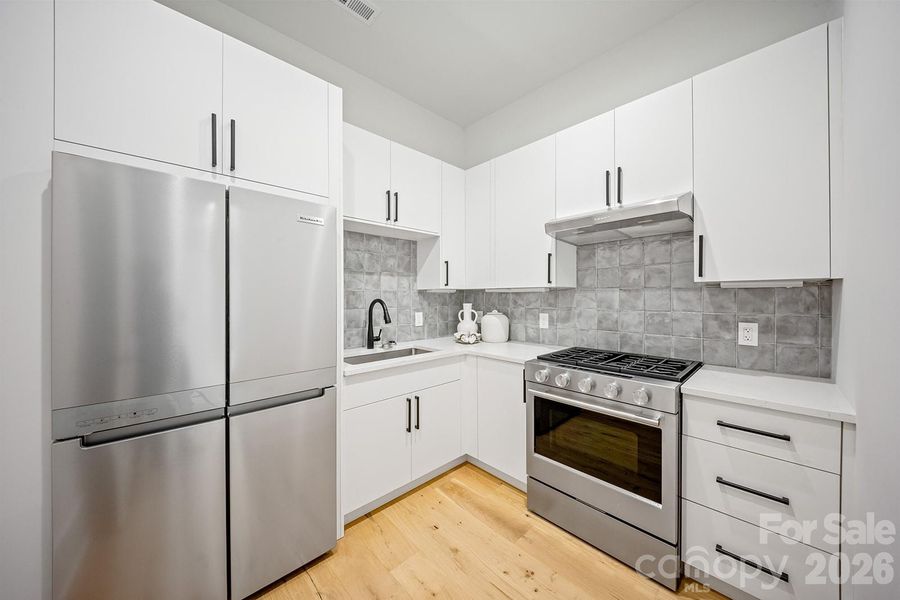 Furnished interior view inside a new home in , Charlotte (Image 6).