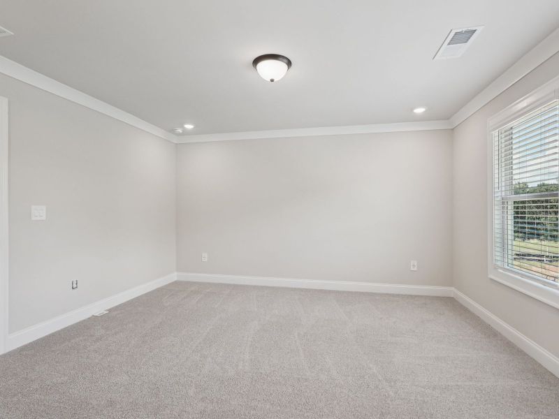 Spacious, unfurnished interior of a new home in Hemingway - Highland Series, Cumming (Image 16).