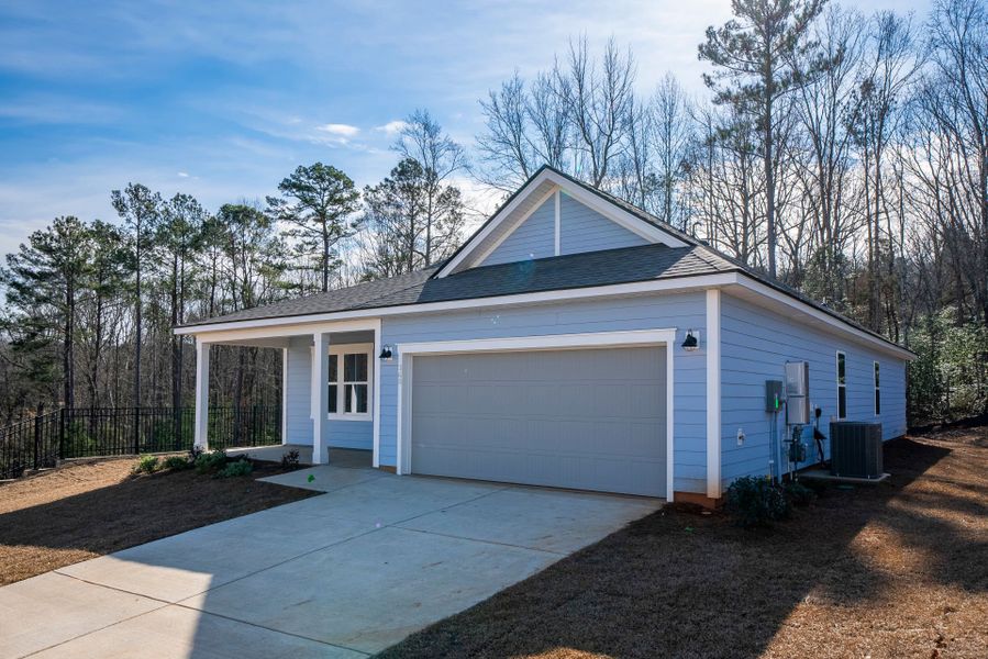 Front exterior of a new home in Carriage Estates, Lexington, SC, highlighting curb appeal (Image 23). Front exterior of a new home in Carriage Estates, Lexington, SC, highlighting curb appeal (Image 23).