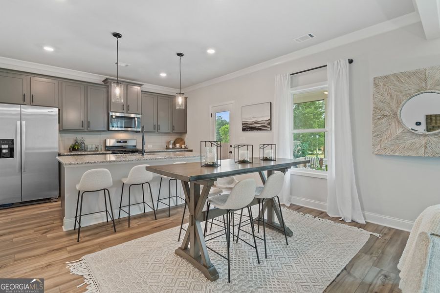 Furnished interior view inside a new home in Ponderosa Farms Manor, Gainesville (Image 7).