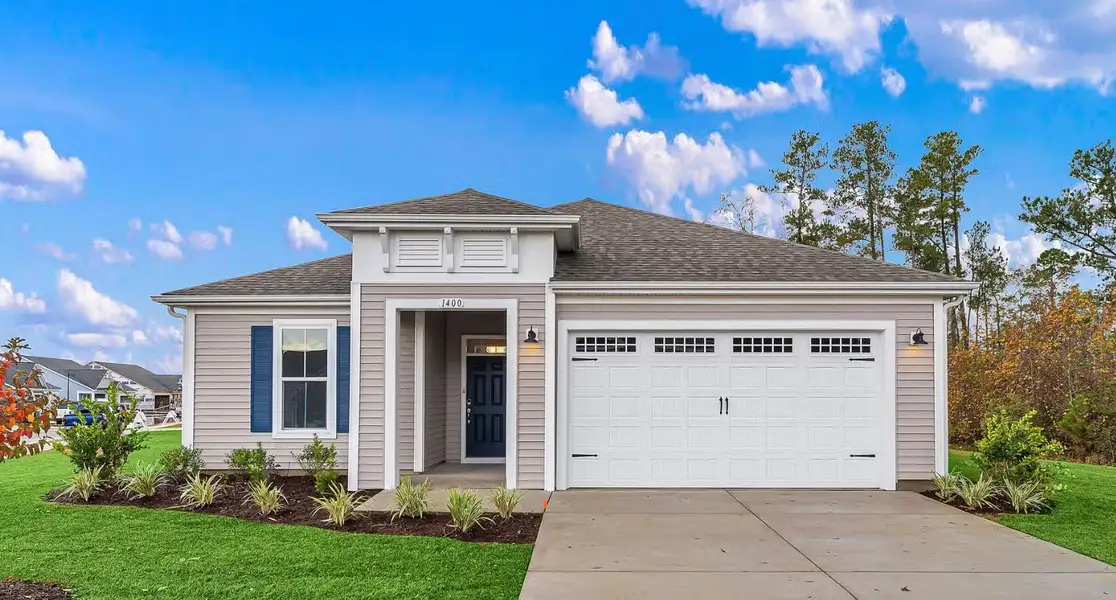 Representative exterior photo of a completed home built from the The Redbud by Chesapeake Homes in Traditions at Carolina Forest, Myrtle Beach, SC (Image 1). Representative exterior photo of a completed home built from the The Redbud by Chesapeake Homes in Traditions at Carolina Forest, Myrtle Beach, SC (Image 1).