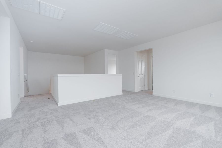 Spacious, unfurnished interior of a new home in Soleo, Queen Creek (Image 12).