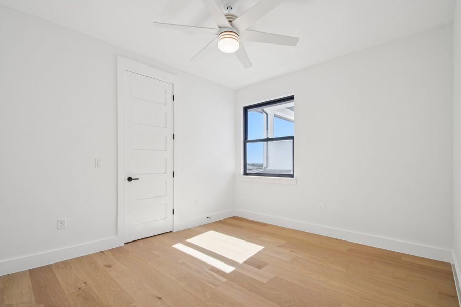 Spacious, unfurnished interior of a new home in Milky Way at River Place, Austin (Image 29).