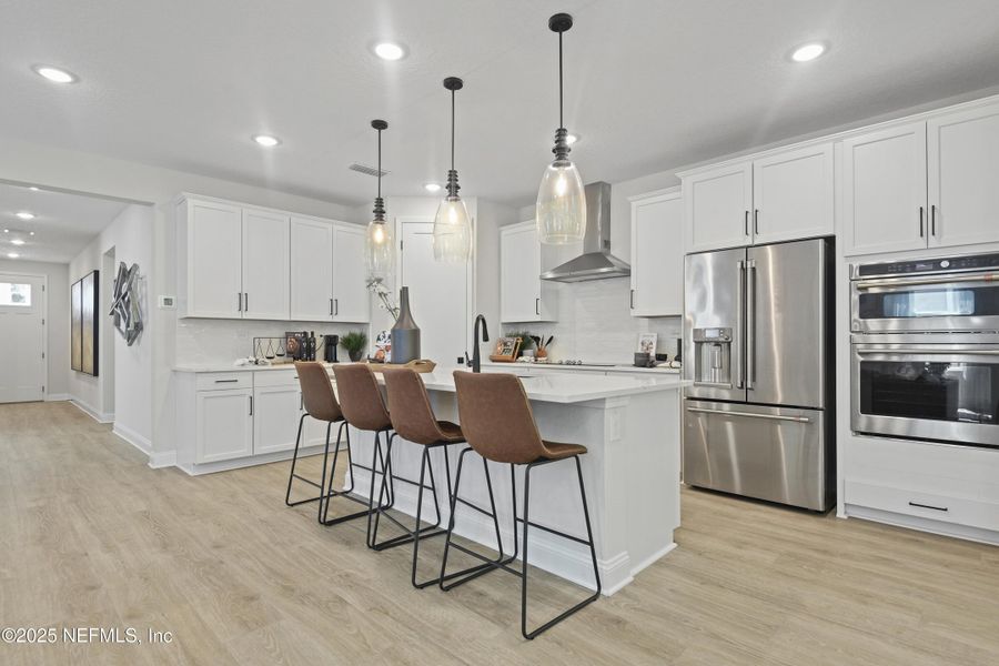 Furnished interior view inside a new home in Coastal Gardens, Palm Coast (Image 13).