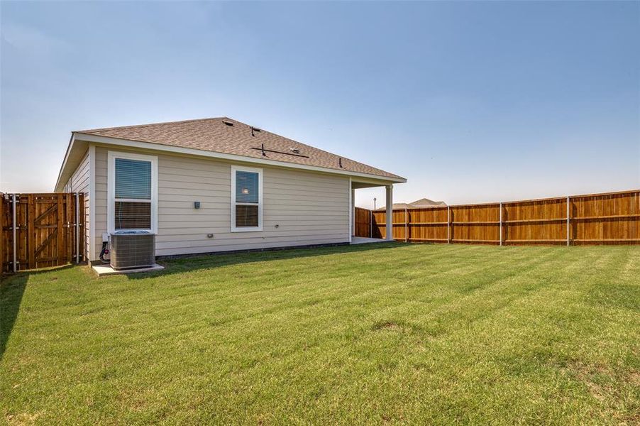 Front exterior of a new home in Cottonwood Creek, Seagoville, TX, highlighting curb appeal (Image 15). Front exterior of a new home in Cottonwood Creek, Seagoville, TX, highlighting curb appeal (Image 15).