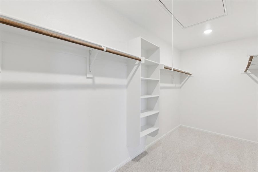 Primary Closet in the Harrison home plan by Trophy Signature Homes – REPRESENTATIVE PHOTO Primary Closet in the Harrison home plan by Trophy Signature Homes – REPRESENTATIVE PHOTO