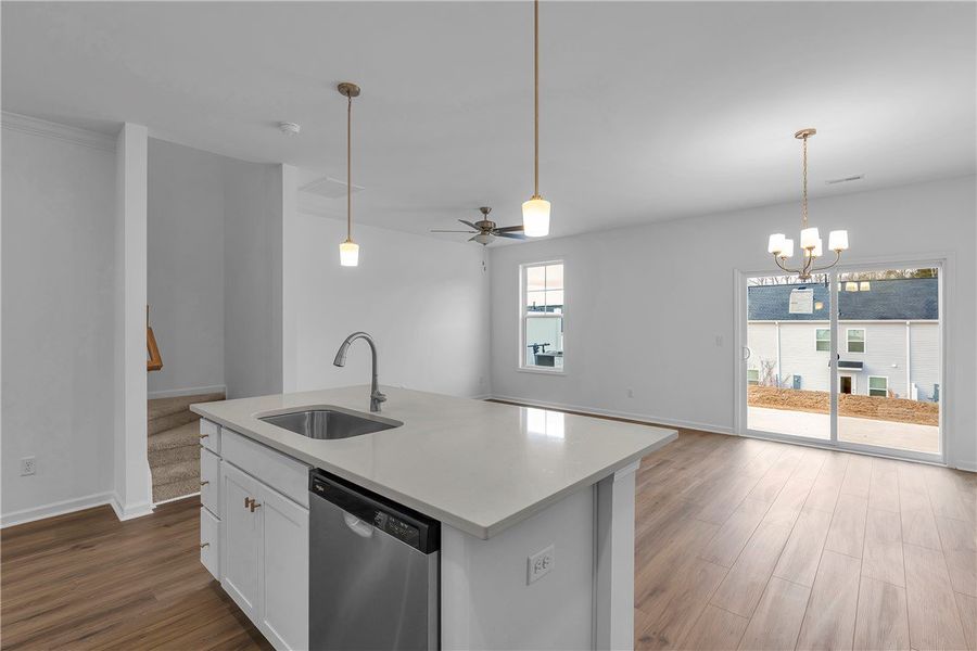 This bright kitchen with a spacious island connect This bright kitchen with a spacious island connect