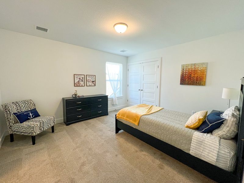 Representative furnished interior of a home built from the Cypress by Perfection Builders in Heritage Commons, Andover (Image 7).