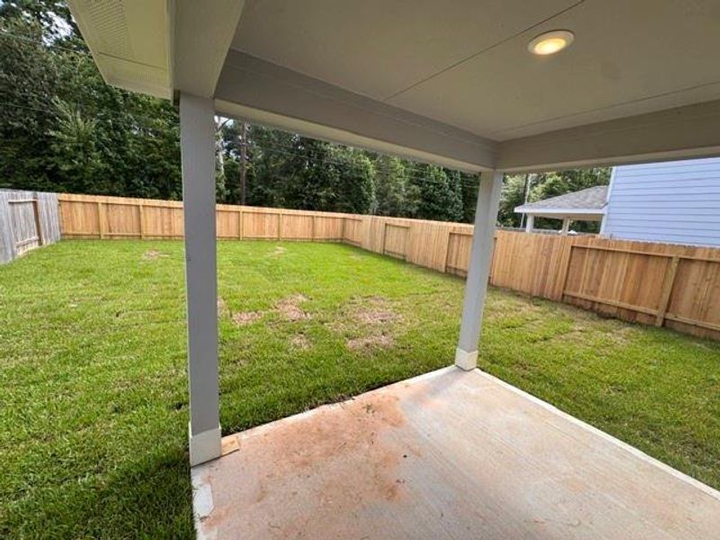 Exterior details and patio area of a home in Townsend Reserve, Splendora (Image 3).