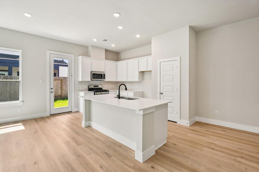 Furnished interior view inside a new home in Alicante, Houston (Image 7).