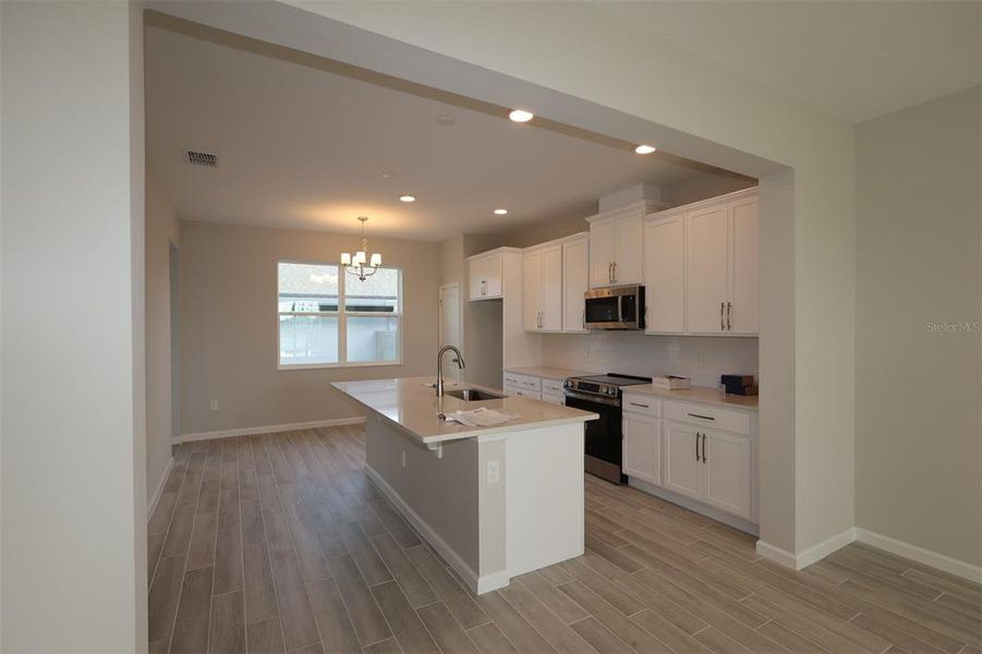 Furnished interior view inside a new home in Center Lake on the Park, St. Cloud (Image 8). Furnished interior view inside a new home in Center Lake on the Park, St. Cloud (Image 8).