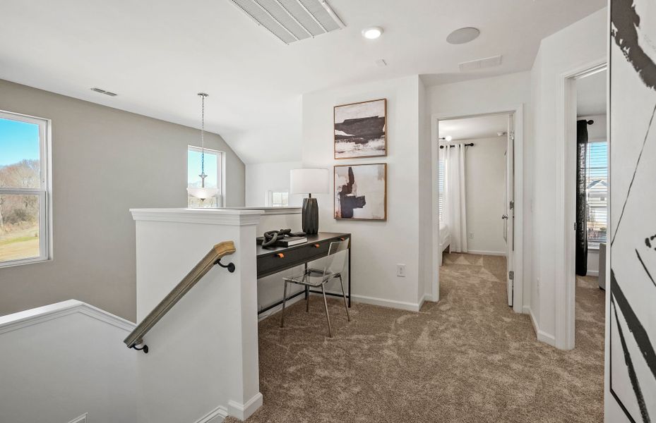 Representative furnished interior of a home built from the Palomino by Pulte Homes in Riverstone, Monroe (Image 11).