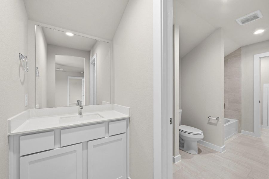 Furnished interior view inside a new home in Sunterra Lakes, Fulshear (Image 13). Furnished interior view inside a new home in Sunterra Lakes, Fulshear (Image 13).