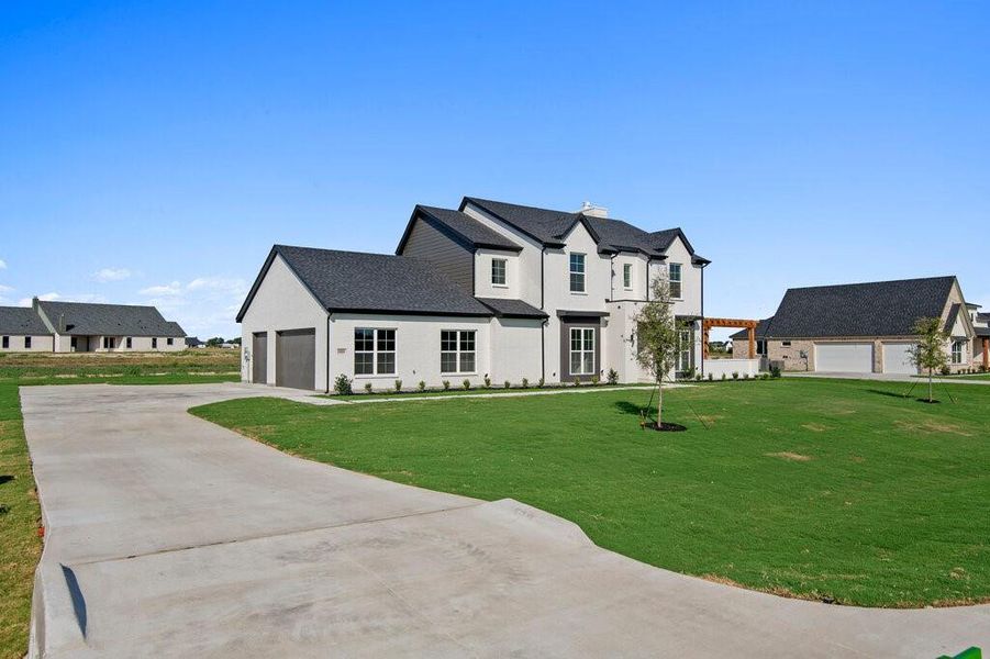 Front exterior of a new home in , Midlothian, TX, highlighting curb appeal (Image 22). Front exterior of a new home in , Midlothian, TX, highlighting curb appeal (Image 22).