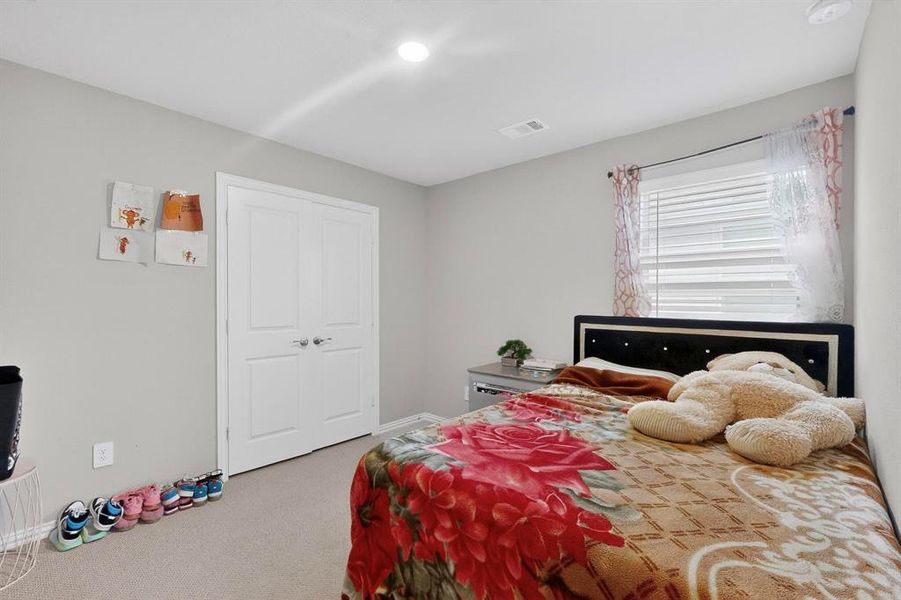 View of carpeted bedroom View of carpeted bedroom