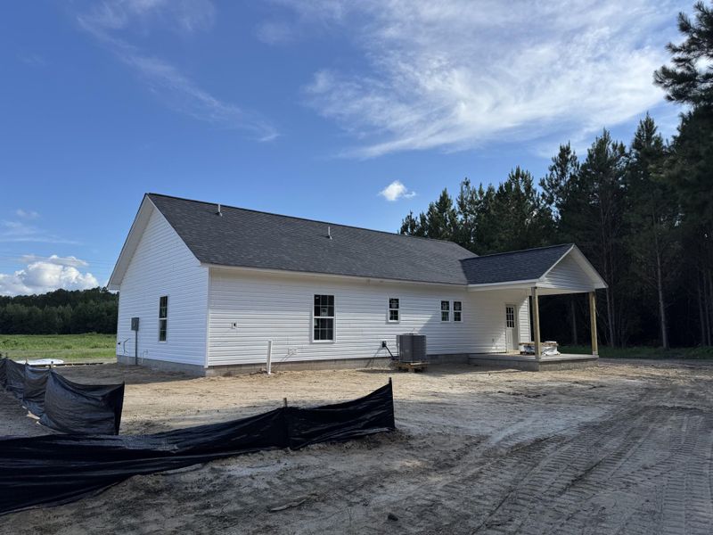 Front exterior of a new home in , St. George, SC, highlighting curb appeal (Image 2).