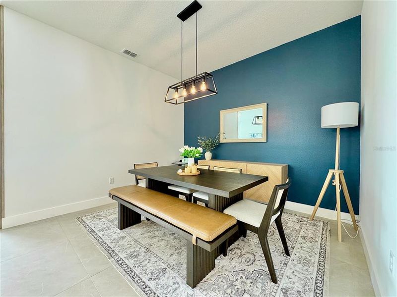 Furnished interior in a model home at Weslyn Park at Sunbridge (Craft Homes) in St. Cloud (Image 7).