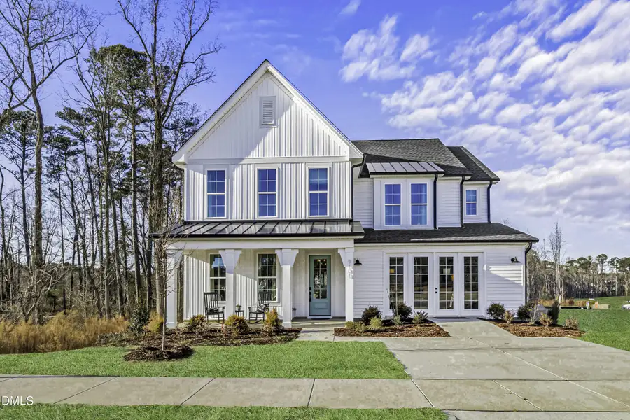 Front exterior of a new home in Kennebec Crossing, Angier, NC, highlighting curb appeal (Image 1). Front exterior of a new home in Kennebec Crossing, Angier, NC, highlighting curb appeal (Image 1).