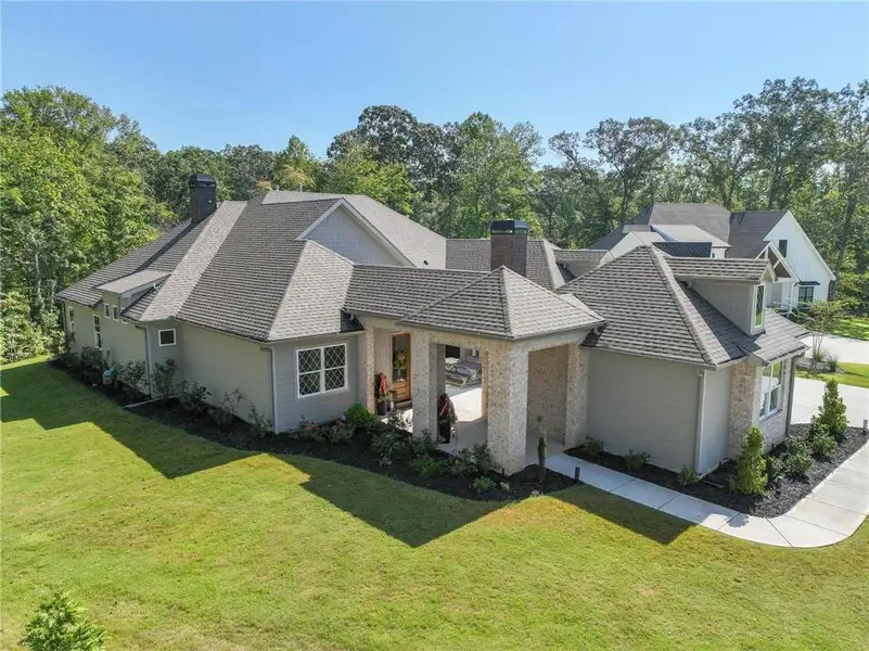 Front exterior of a new home in , Newnan, GA, highlighting curb appeal (Image 23).