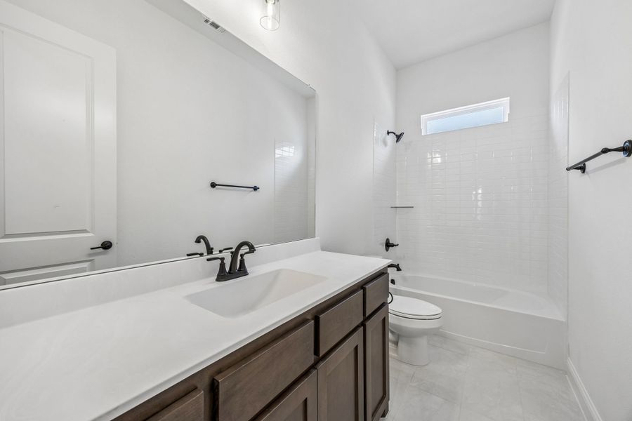 Furnished interior view inside a new home in Country Lakes, Denton (Image 14).