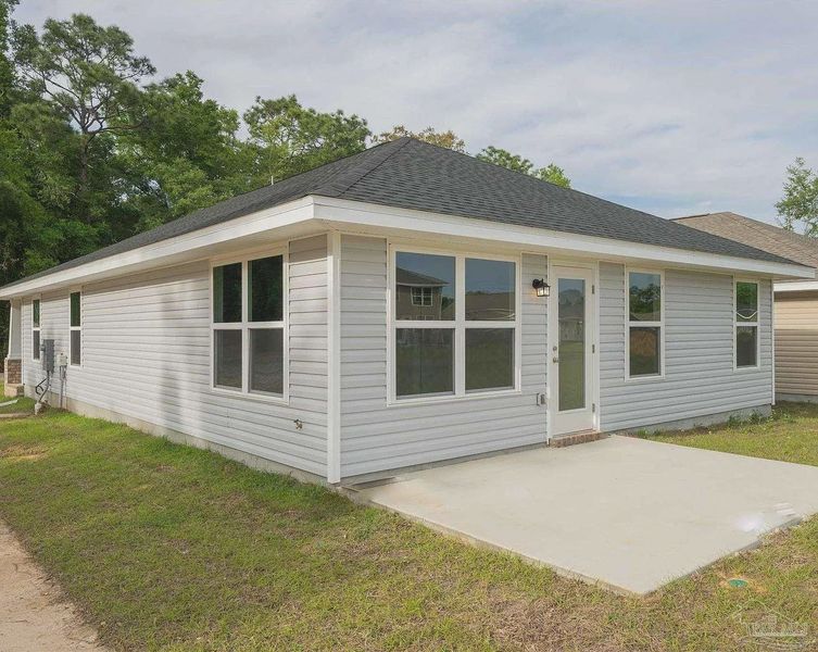 Exterior details and patio area of a home in Turtle Creek, Cantonment (Image 2).