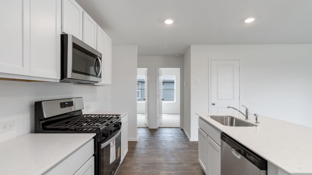 Representative furnished interior of a home built from the T30B Barton by D.R. Horton in Riverfield, Josephine (Image 7).