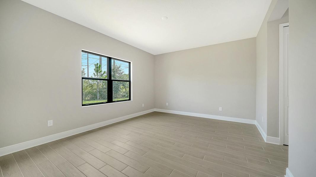 Spacious, unfurnished interior of a new home in Vicenza Real Estate and Homes for Sale in North Venice, FL - Neal Communities, Venice (Image 28).