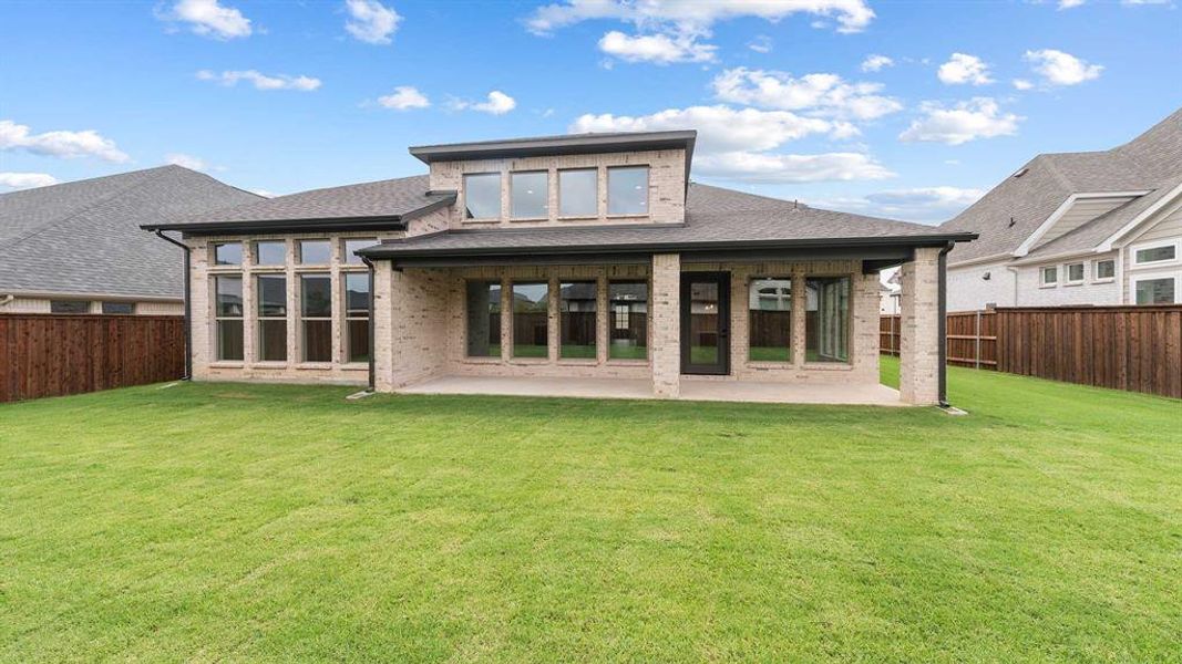 Front exterior of a new home in The Lakes Of Somercrest 60', Midlothian, TX, highlighting curb appeal (Image 18). Front exterior of a new home in The Lakes Of Somercrest 60', Midlothian, TX, highlighting curb appeal (Image 18).