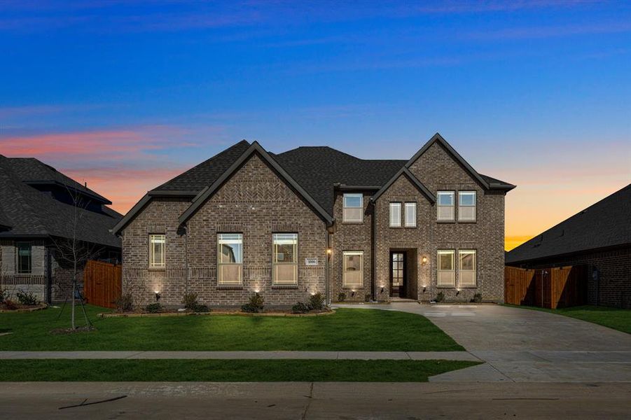 Front exterior of a new home in Timberbrook, Justin, TX, highlighting curb appeal (Image 26).