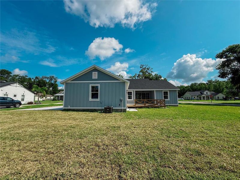 Front exterior of a new home in , Lake Helen, FL, highlighting curb appeal (Image 24). Front exterior of a new home in , Lake Helen, FL, highlighting curb appeal (Image 24).