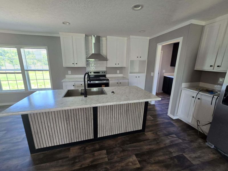Furnished interior view inside a new home in , St. Stephen (Image 4).