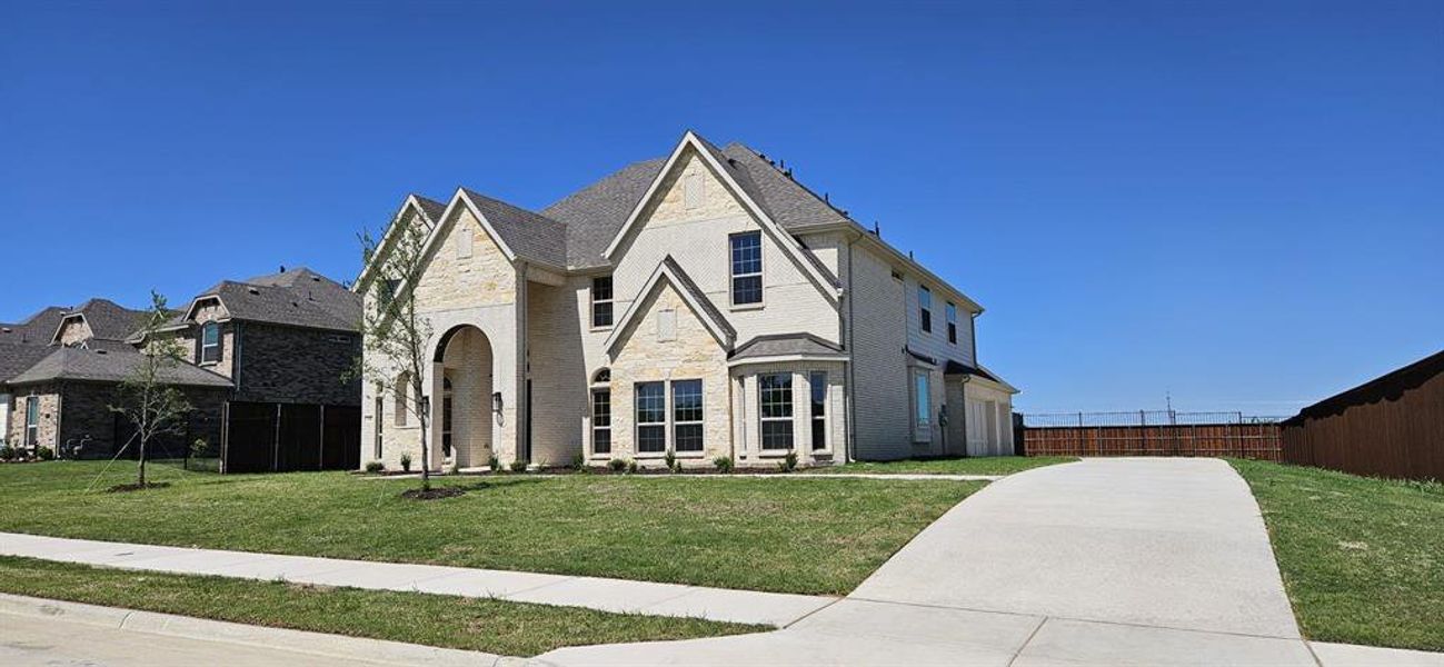 Front exterior of a new home in , Haslet, TX, highlighting curb appeal (Image 20).