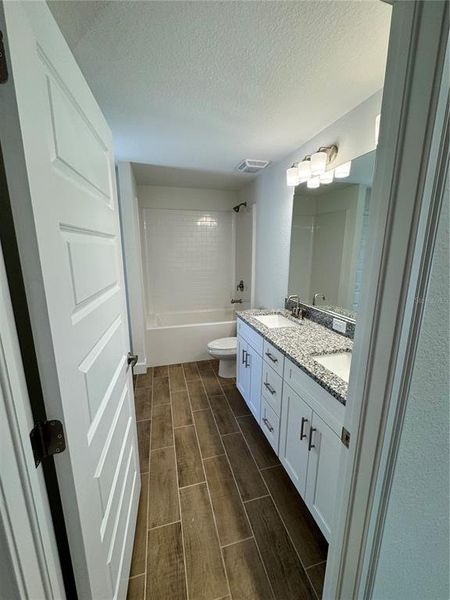 Furnished interior view inside a new home in North Port, North Port (Image 1).