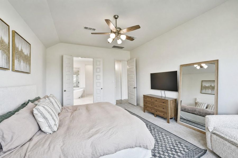 Furnished interior view inside a new home in Artavia, Conroe (Image 37).