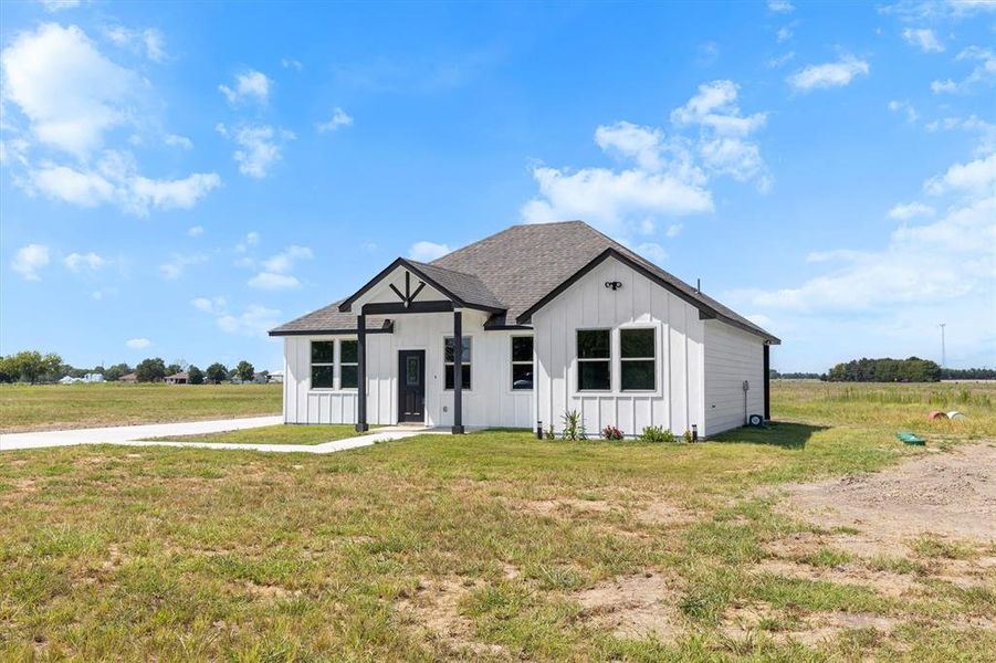 Front exterior of a new home in , Commerce, TX, highlighting curb appeal (Image 18). Front exterior of a new home in , Commerce, TX, highlighting curb appeal (Image 18).