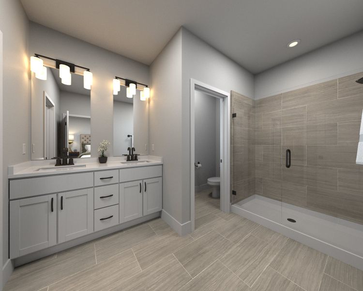 The primary bathroom offers dual sinks and a walk-in closet.