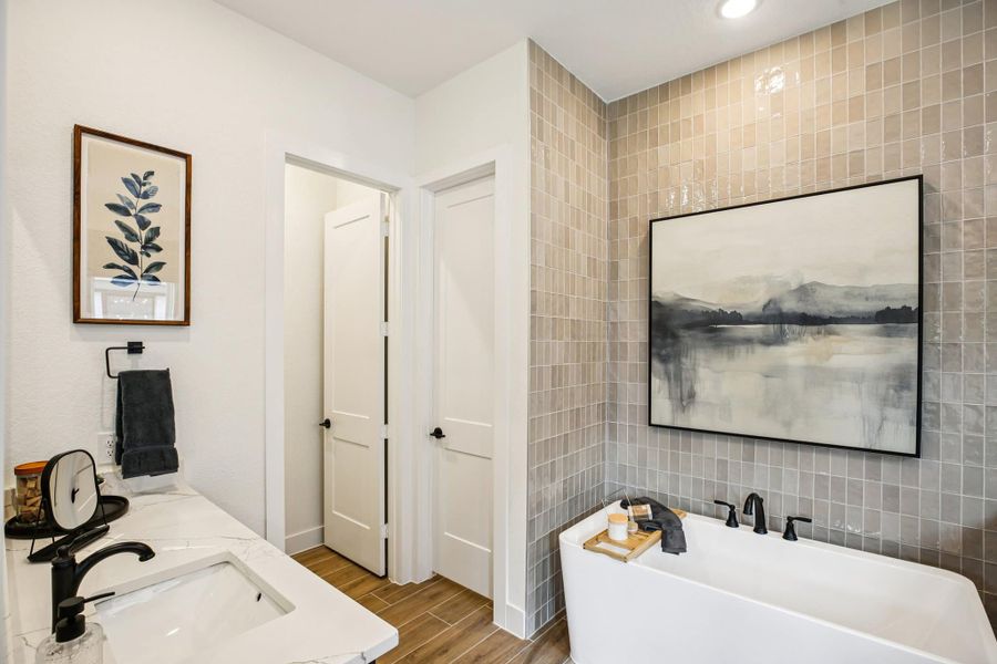 Furnished interior view inside a new home in Bridgeland, Cypress (Image 27).