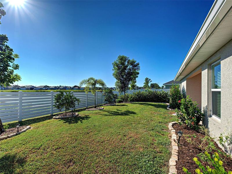 Exterior details and patio area of a home in Watercress Cove, North Port (Image 27).