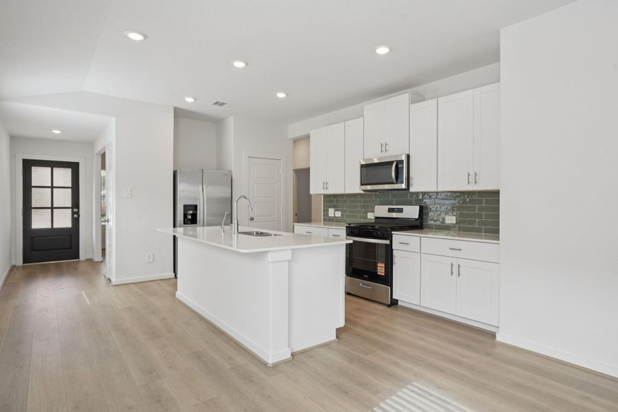 Furnished interior view inside a new home in Pine Lake Cove - Traditional Series, Montgomery (Image 8).