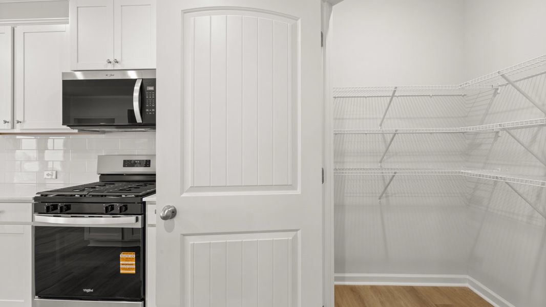 Representative furnished interior of a home built from the Fayette ll by D.R. Horton in Braselton Village, Braselton (Image 8).