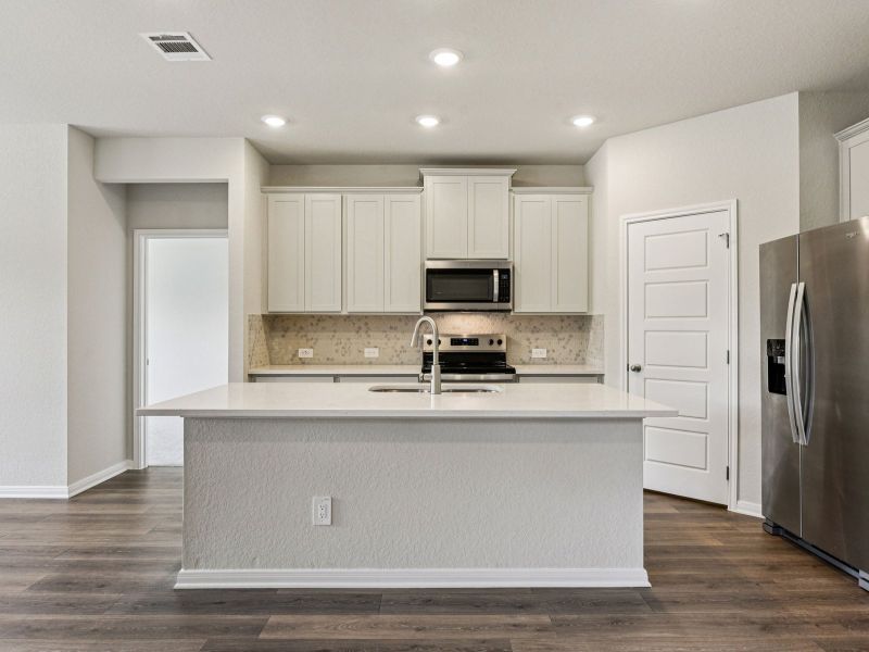 Furnished interior view inside a new home in Comanche Ridge, San Antonio (Image 7).