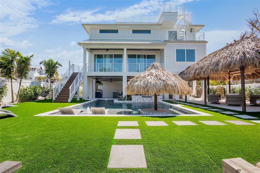 Front exterior of a new home in , Anna Maria, FL, highlighting curb appeal (Image 20).