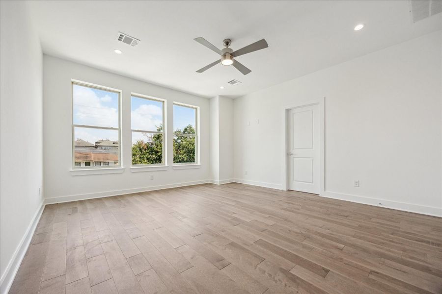 Primary Bedroom is on the Third Floor * Real Hardwood Floors * BIG Windows.