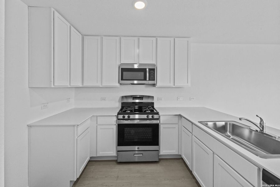 Furnished interior view inside a new home in Spring Grove, St. Hedwig (Image 7).