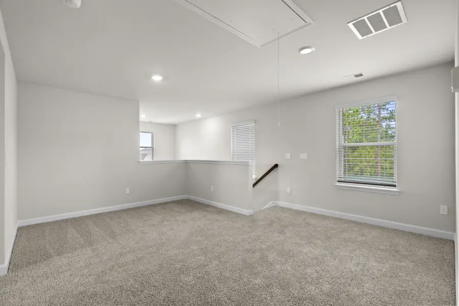 Spacious, unfurnished interior of a new home in Waterside - Boardwalk Series, Longs (Image 26). Spacious, unfurnished interior of a new home in Waterside - Boardwalk Series, Longs (Image 26).
