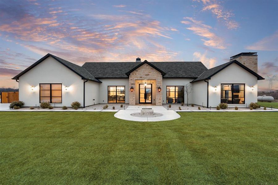 Front exterior of a new home in , Krum, TX, highlighting curb appeal (Image 1). Front exterior of a new home in , Krum, TX, highlighting curb appeal (Image 1).